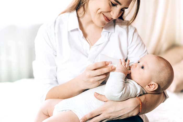 Mother nursing baby