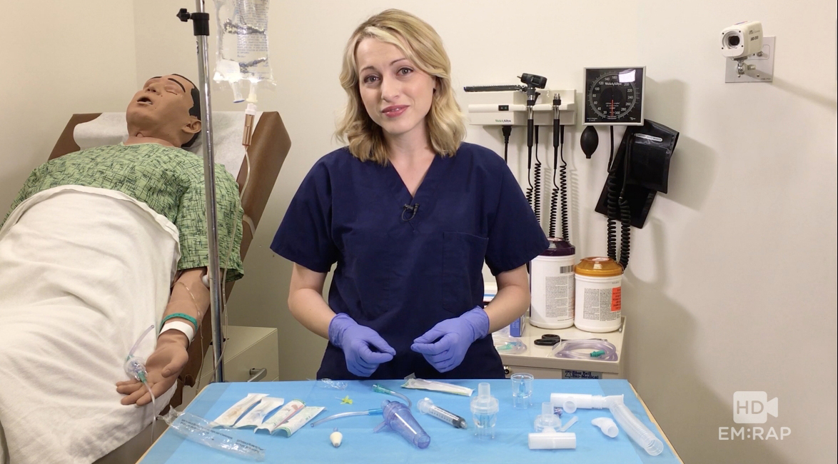 Medical student showing off various medical equipment